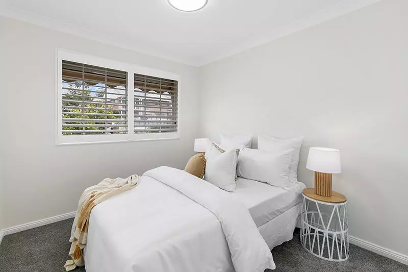 Gorgeously renovated 3 bedroom unit with modern look, level access and leafy district views.