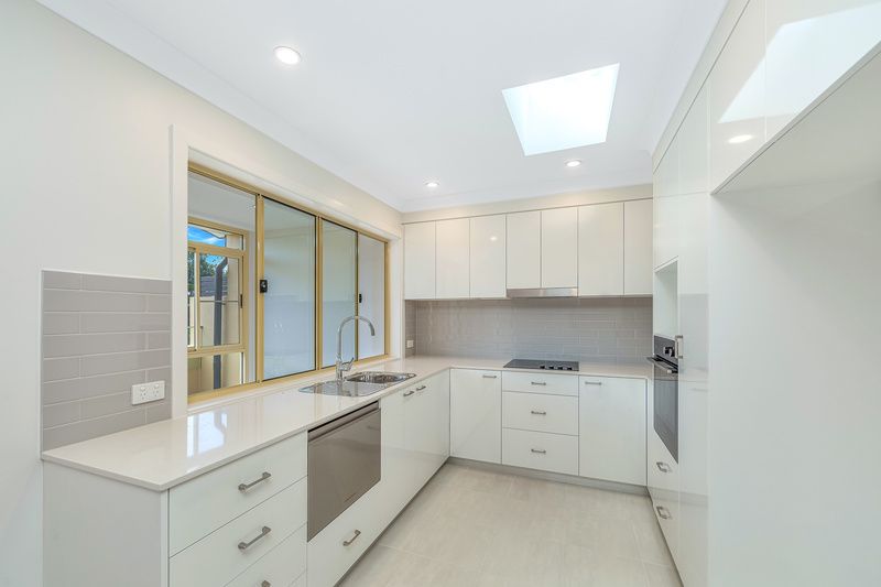 Light-Filled Home with Sunroom and Space to Live