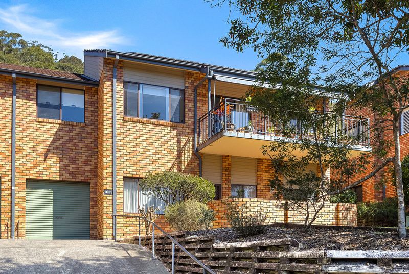 Sunlit Lower-Level Home with Courtyard