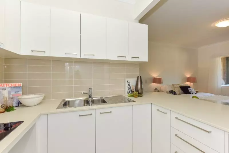 Ground floor studio apartment with east facing enclosed balcony