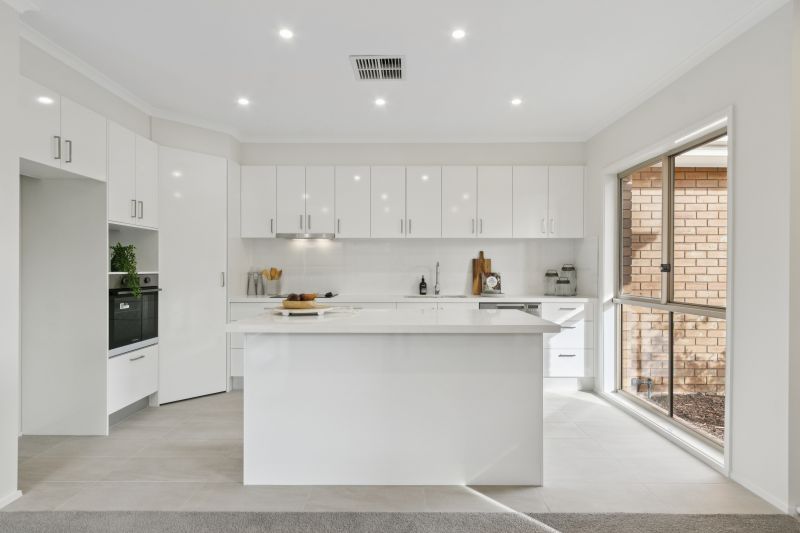 Discover serene living in this fully upgraded two-bedroom villa