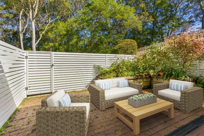 Immaculate Ground-Floor Retreat with Expansive Courtyard Close to Clubhouse