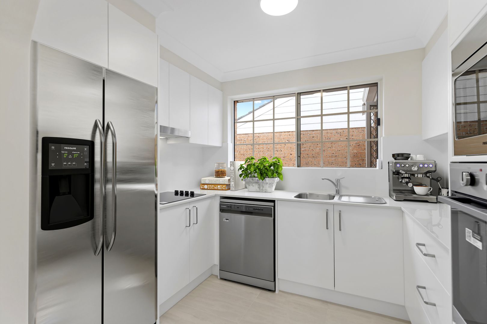 An elegant, fully renovated one-bedroom unit overlooking gardens.