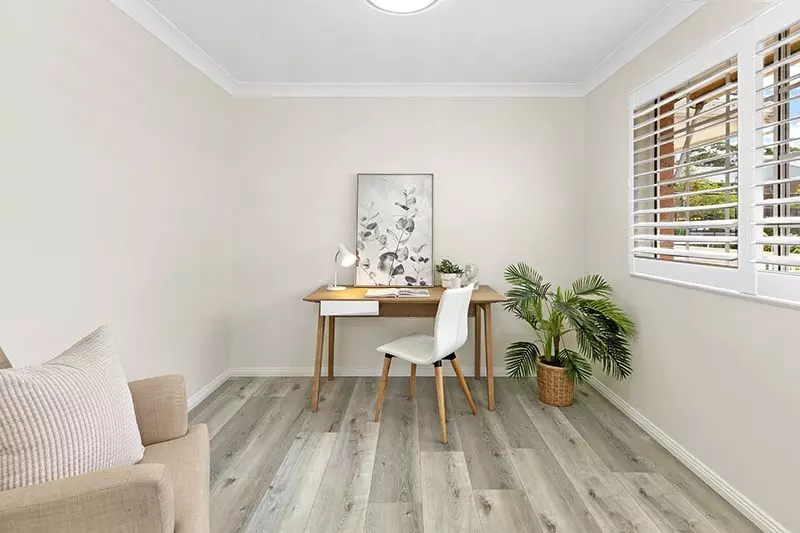 Gorgeously renovated 3 bedroom unit with modern look, level access and leafy district views.