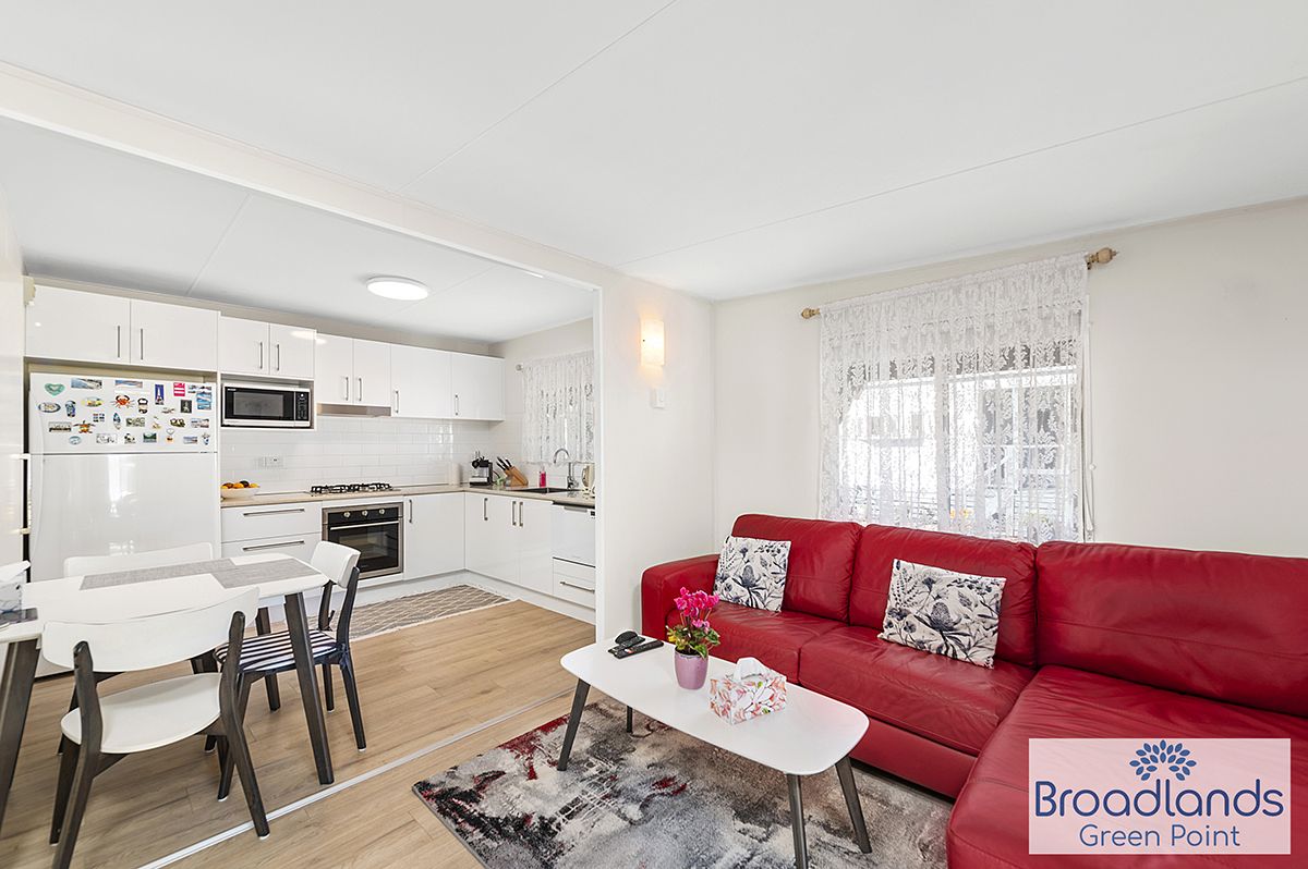 UNDER CONTRACT - Excellent Presentation - Super Low Maintenance - Easy Walk to Shopping Centre