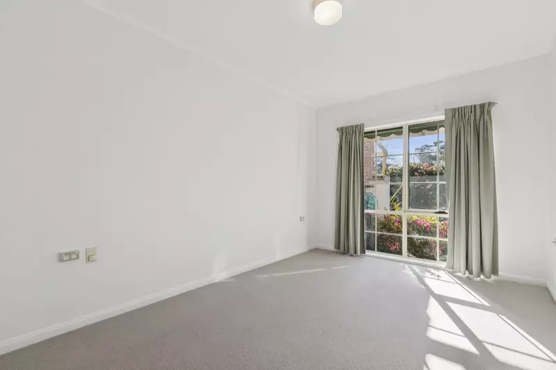 Village Heart Retreat with Vaulted Ceilings and Courtyard