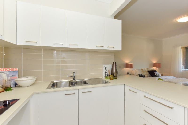 Ground floor studio apartment with east facing enclosed balcony