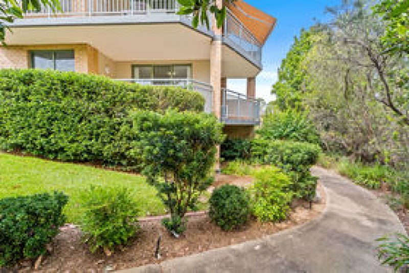 North-facing ground level unit set in enviable park-like surrounds