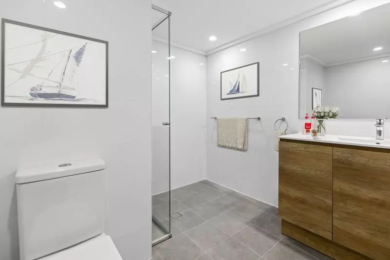 Centrally located, renovated ground floor unit surrounded by lush gardens with large courtyard.