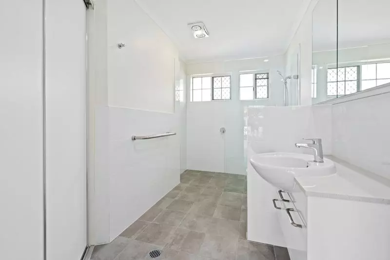 Beautiful two-bedroom, one bathroom villa with covered rear entertaining area.