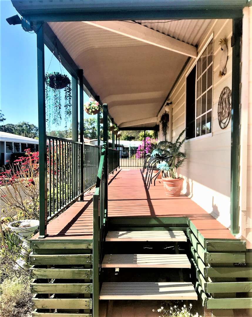 Two bedroom home on a large site,  a  short stroll away from recreation area, lush bushland and shopping centre
