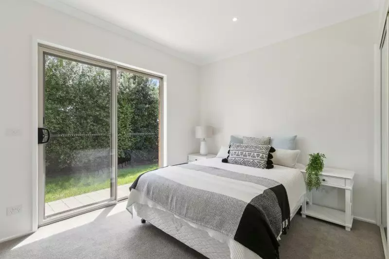 Enjoy serene living in this modern two-bedroom villa