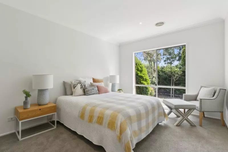 Enjoy serene living in this modern two-bedroom villa