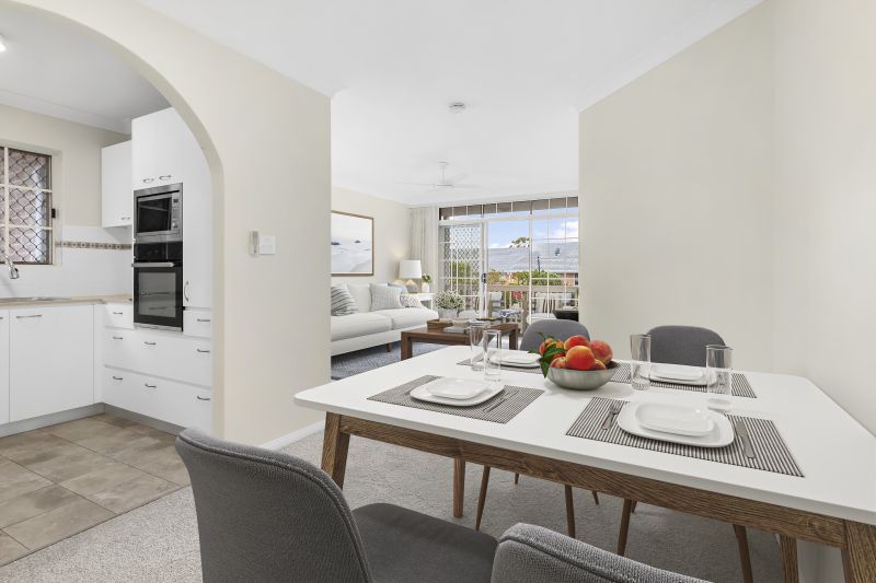 Elegantly renovated ground floor unit overlooking beautiful gardens close to clubhouse.