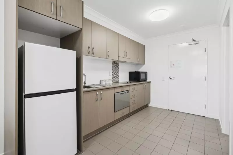 Elevated one-bedroom apartment in peaceful green setting