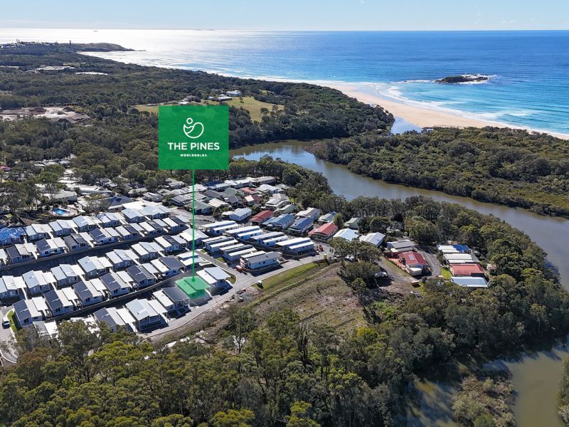 Opposite green space, on a corner lot