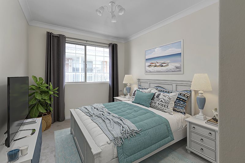 Immaculately presented upper level unit with leafy garden views