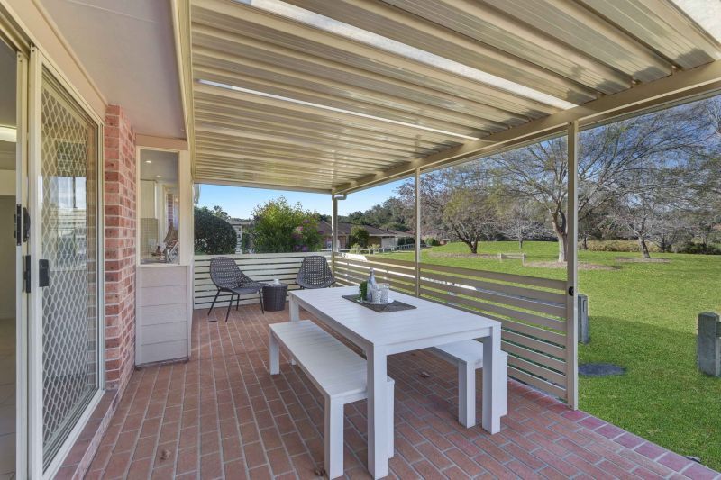 Sit back and relax on your patio! Looking onto the parkland enjoying the lifestyle here at Tarragal Glen!