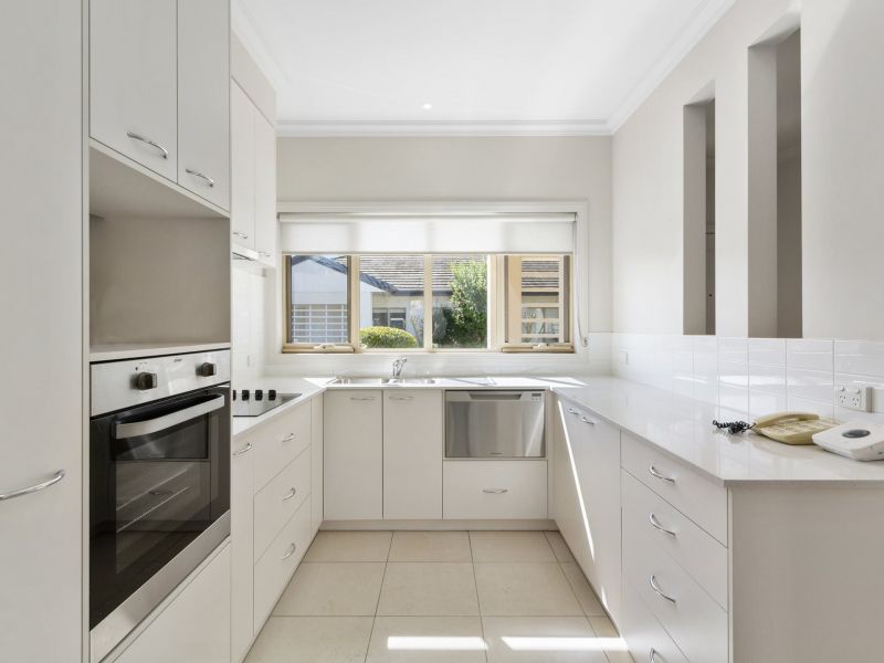 Beautifully Updated Unit with High Ceilings and Convenient Layout