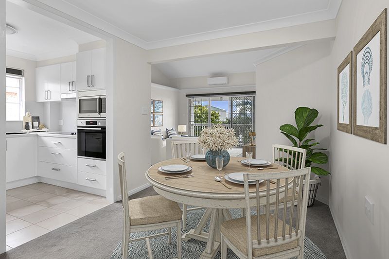 Perfectly located, renovated unit with easy ramp access and lovely district views.