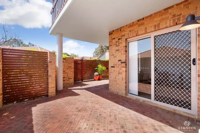 UNDER OFFER. Light-filled, Ground Floor Apartment with Wrap-Around Courtyard