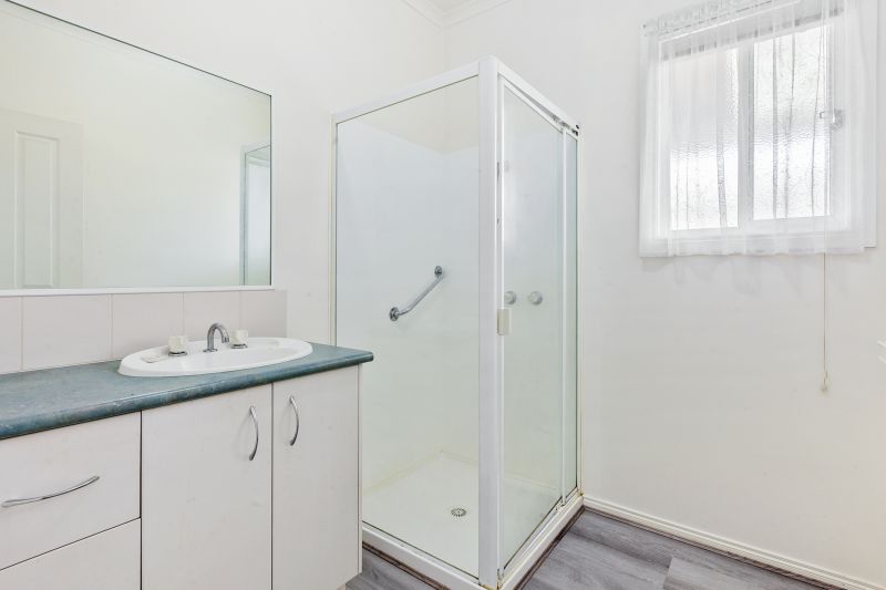 Charming Two-Bedroom Home with Beautiful Gardens