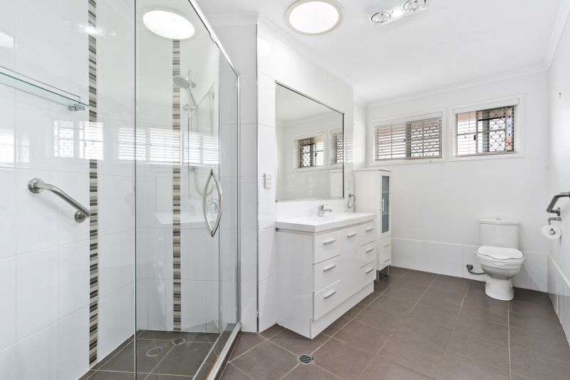 Beautiful two-bedroom, one bathroom villa with covered rear entertaining area.