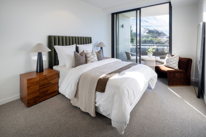 Generous, light-filled two-bedroom residence with a private balcony