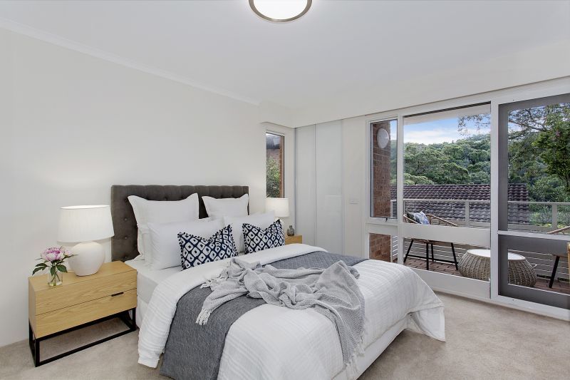 Serene two-bedroom haven overlooking lush forest