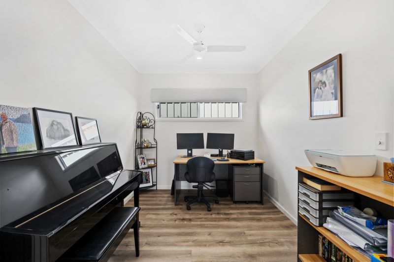 Elevated Home with Spacious Backyard and Modern Interior