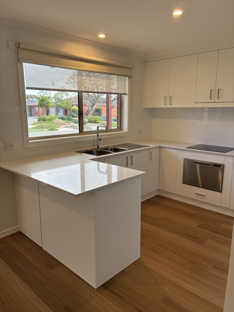 Beautifully Refurbished Two-Bedroom Home Opposite the Community Centre