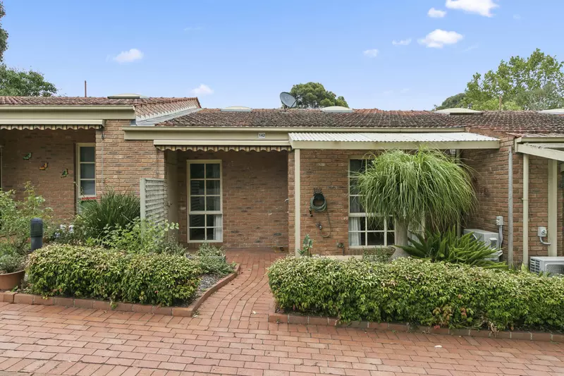 Airy Apartment Living with Vaulted Ceilings