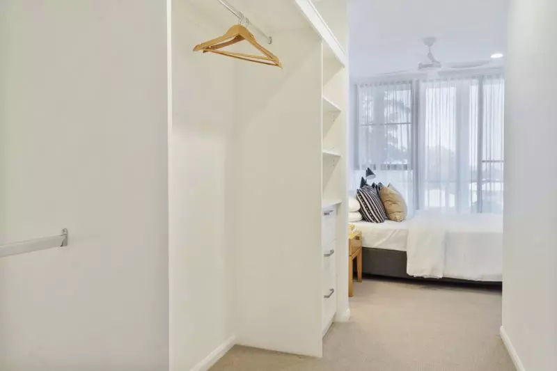 Elegant two-bedroom apartment with peaceful, tree-lined outlooks