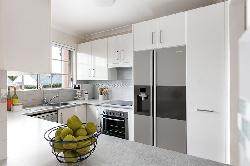 Immaculately maintained 3 bedroom unit with modern look overlooking stunning gardens