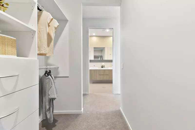 STUNNING DISPLAY HOME FACING TRANQUIL LAKE