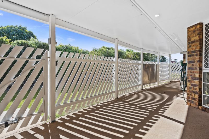 Beautiful two-bedroom, one bathroom villa with covered rear entertaining area.