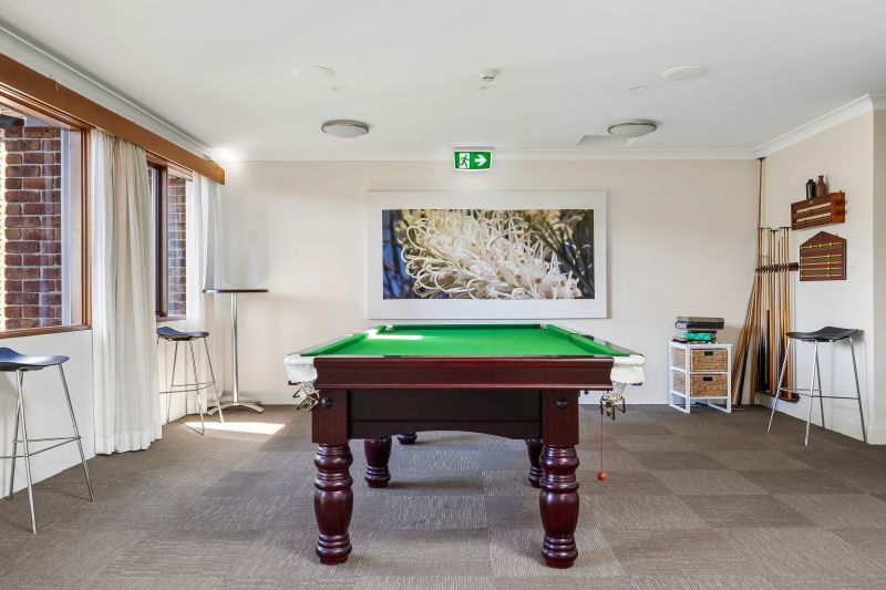 Stunning serviced apartment with breathtaking waterfall and tranquil treescape views.