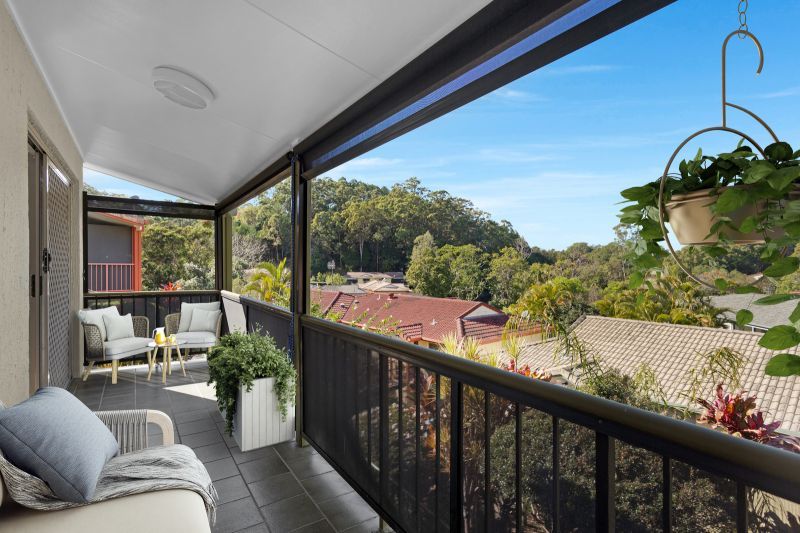 Elevated 2-bedroom villa with scenic views of the trees