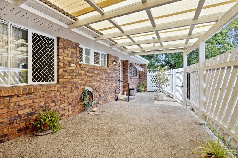 Beautiful two-bedroom, one bathroom villa with covered rear entertaining area.