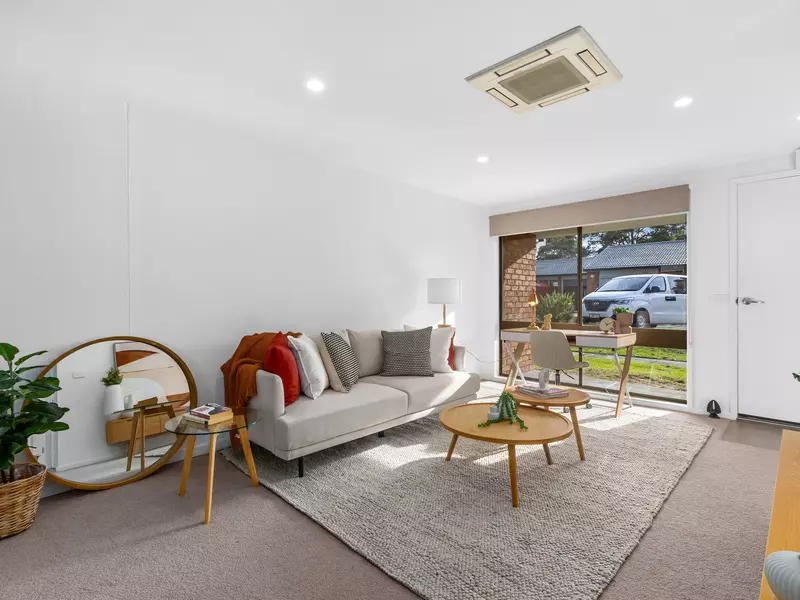 Stylishly Refreshed Unit with Courtyard in Top Location