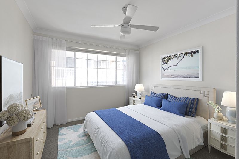 Exquisitely renovated light-filled unit overlooking croquet lawn.