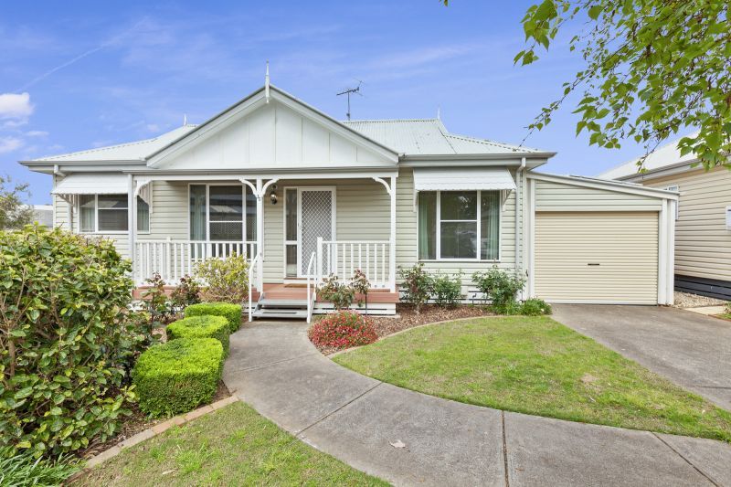 Charming Two-Bedroom Home with Beautiful Gardens