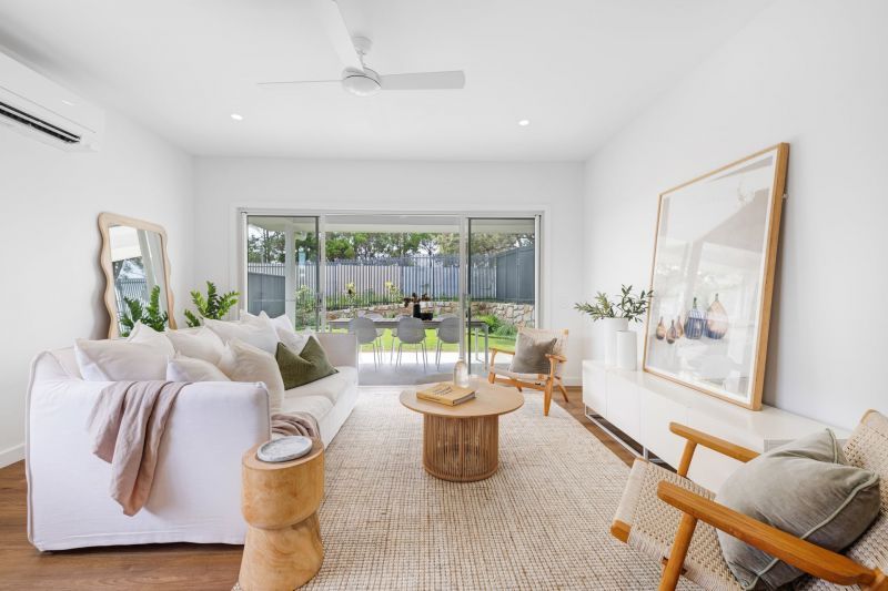 Modern Coastal Retreat with Resort-Style Amenities