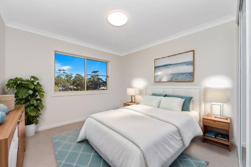 Modern Unit with Sunlit Courtyard, Water Views, and Stylish Upgrades