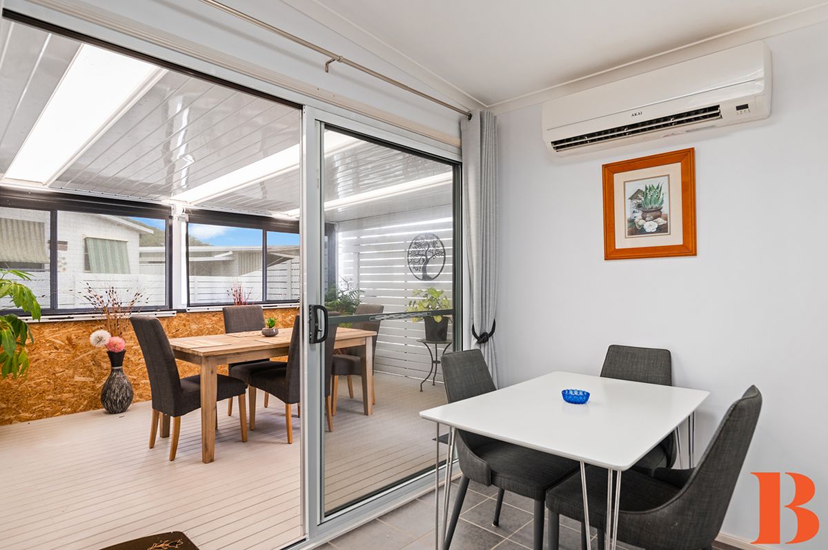 DEPOSIT TAKEN / UNDER CONTRACT - Perfect Presentation - Fabulous indoor/outdoor living room - convenient location