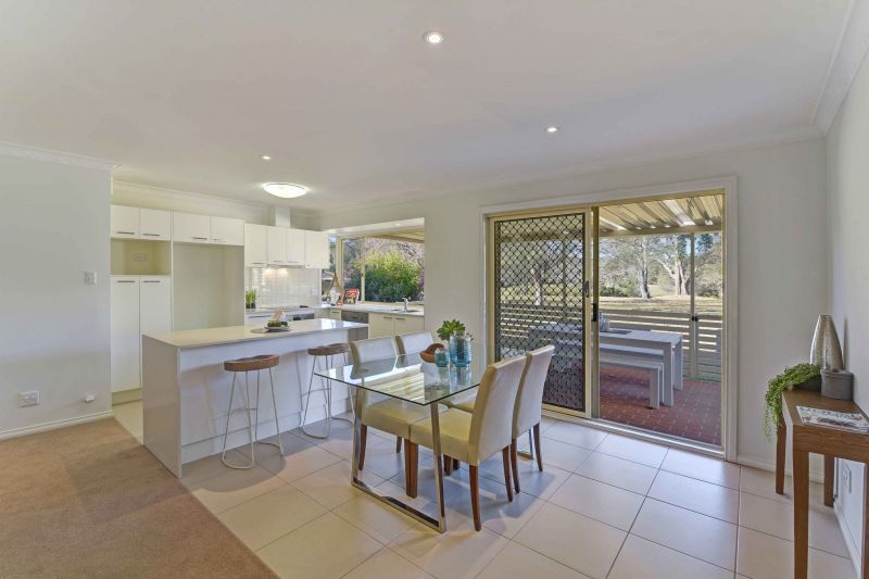 Sit back and relax on your patio! Looking onto the parkland enjoying the lifestyle here at Tarragal Glen!