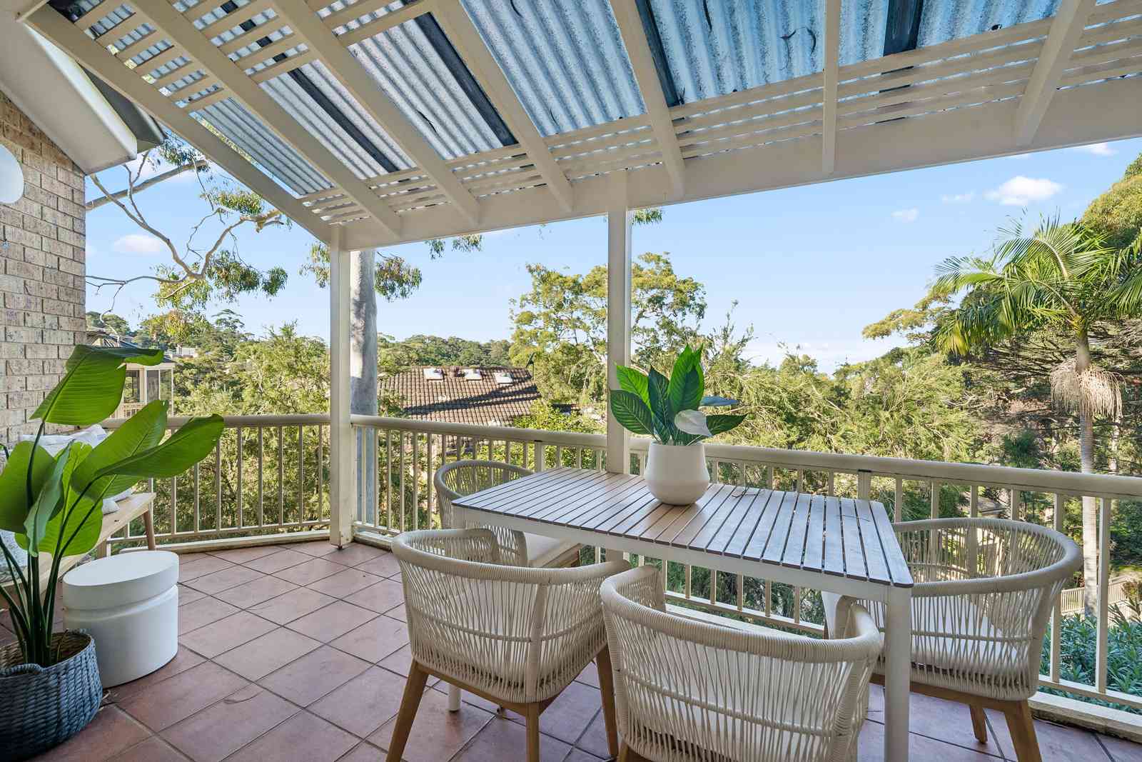 Turn-Key Two-Bedroom Living with Treetop and Water Glimpses