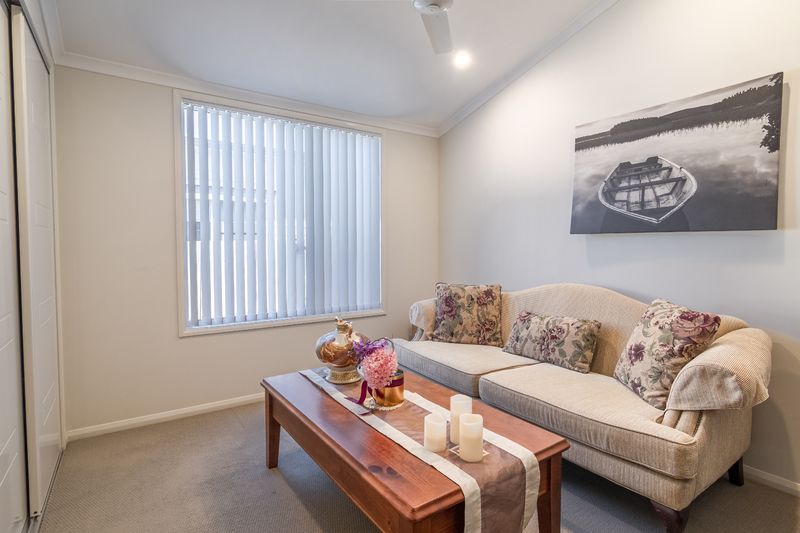 Downsize to this modern 2 bedroom plus full study home in popular over 55s living estate