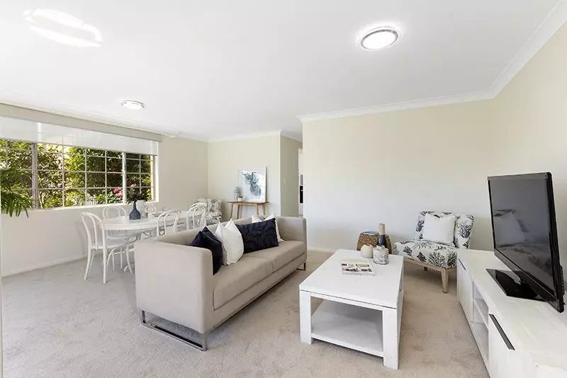 Surrounded by lovely gardens, beautifully renovated ground floor sun-filled unit, right opposite the croquet lawn.