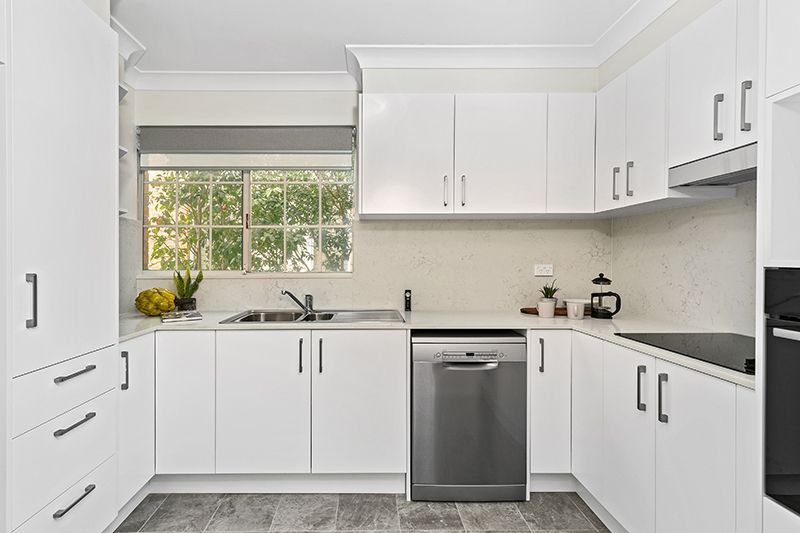 Ideally located, beautifully renovated ground floor sunny unit with large courtyard.